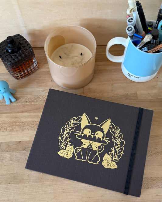Delivery Cat Lay flat Sketchbook