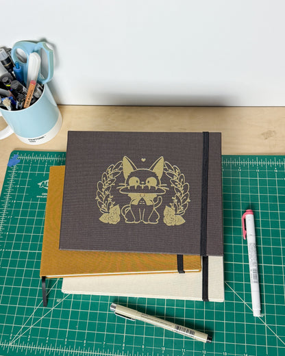 Delivery Cat Lay flat Sketchbook